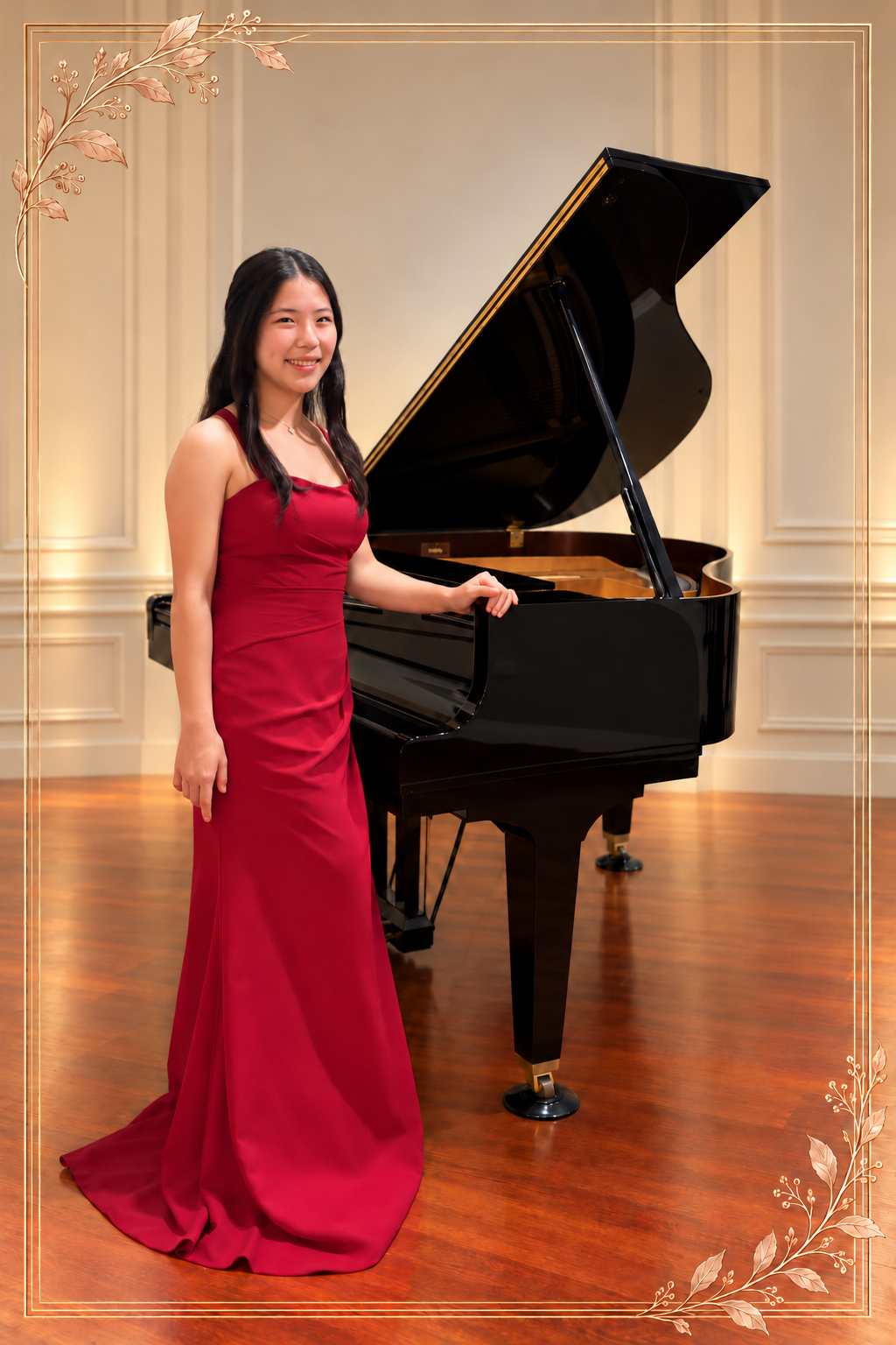 Ellen Hwang in a burgundy gown beside a grand piano